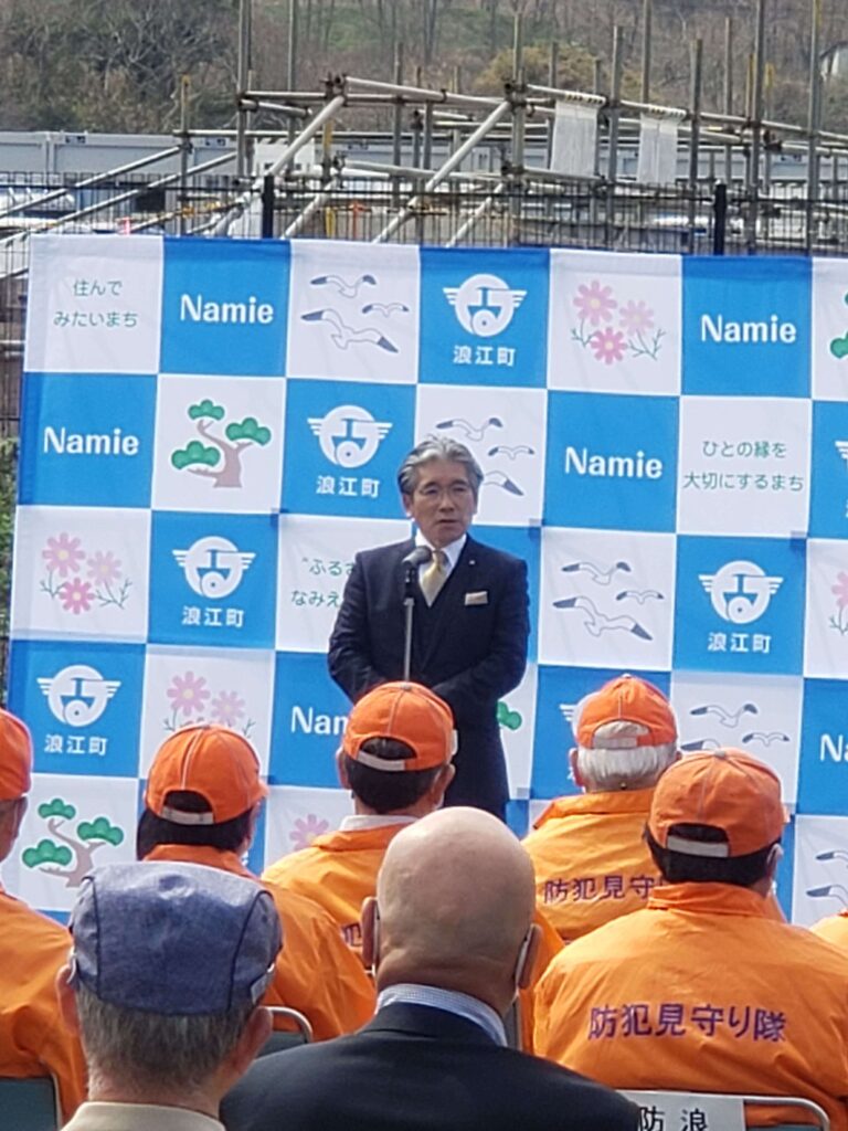 記念式典であいさつする吉田栄光浪江町長